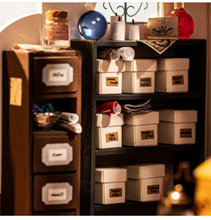 Load image into Gallery viewer, Robotime Rolife DIY Miniature House Kiki's Magic Emporium