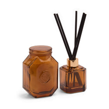 Load image into Gallery viewer, Designworks Botanica 8oz/226g Amber Glass Candle - Leather &amp; Smoke
